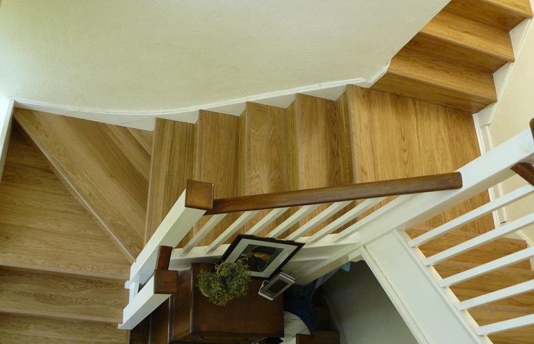 Oak-clad staircase.